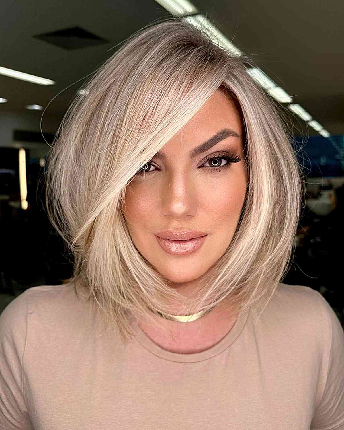 Straight Face-Framing Layers for women with short blonde hair