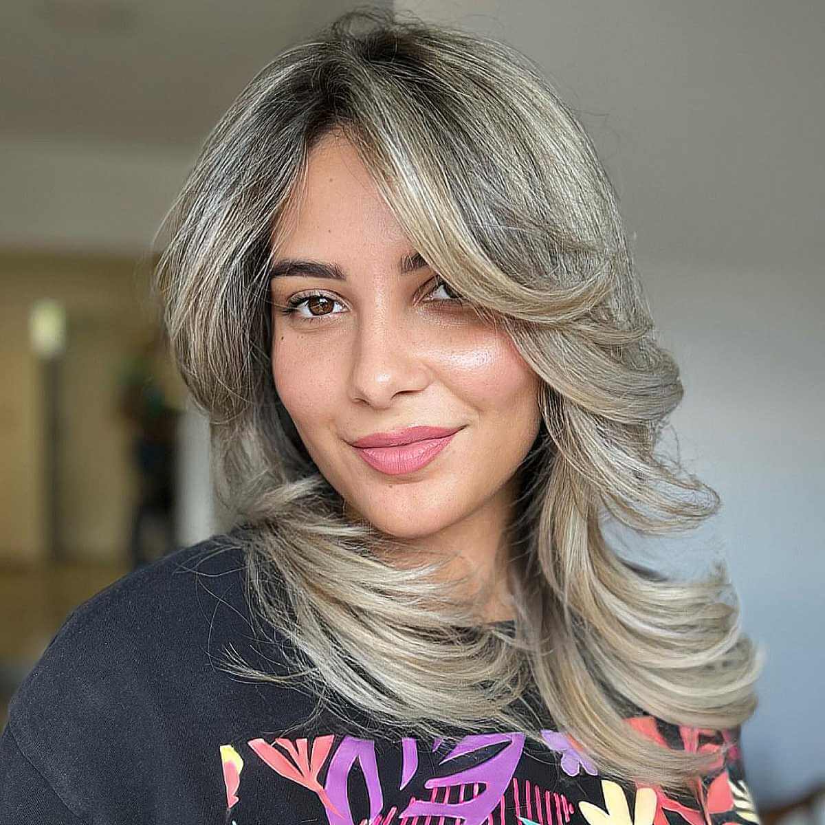 Straight Layered Ashy Blonde Hair with Curled Ends