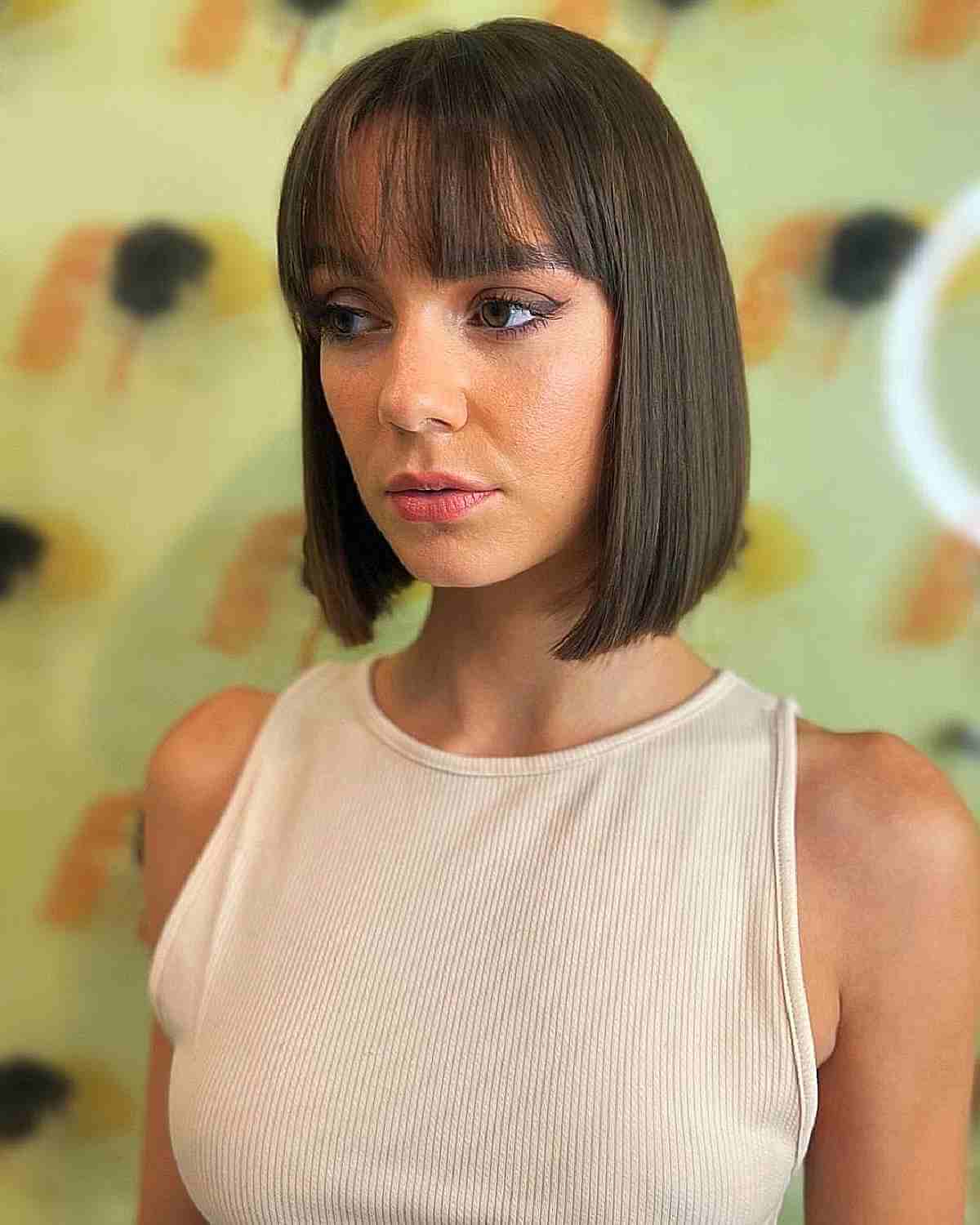 Empowering Straight Lob with Bangs Hairstyle