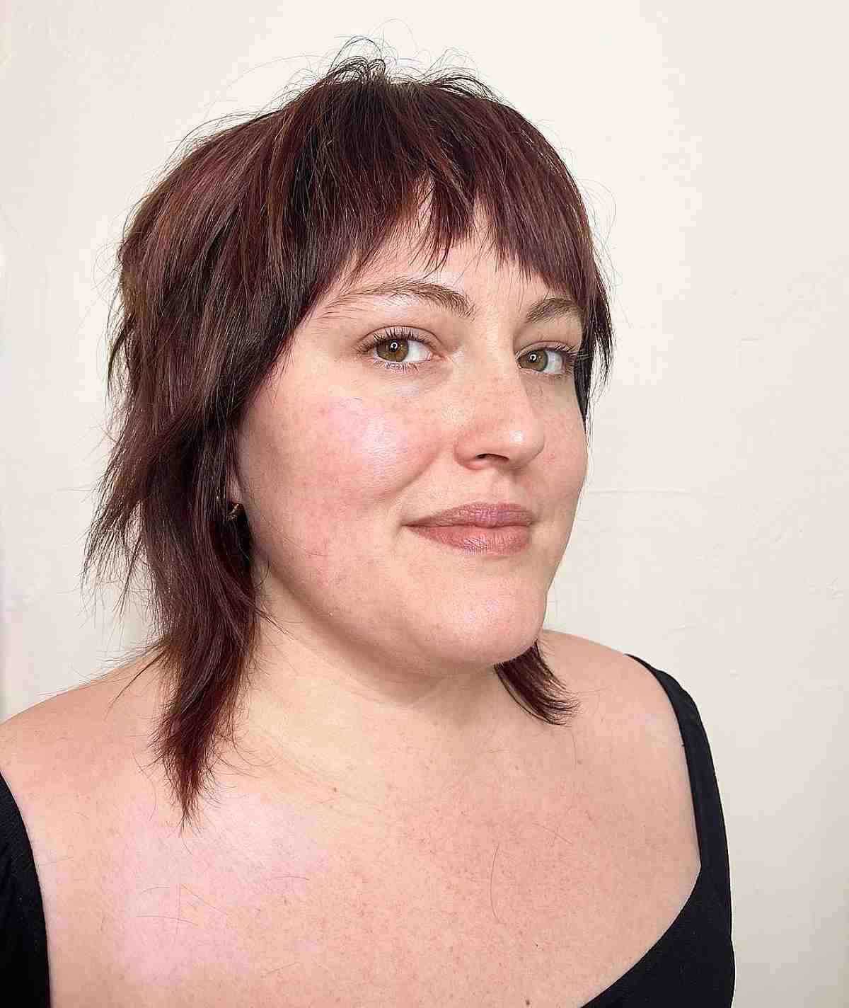 Straight Mini Shag with Choppy Layers and Bangs for Chubby Faces