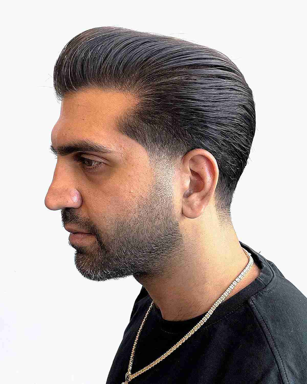 Straight Sleek Quiff with a Low Taper Fade