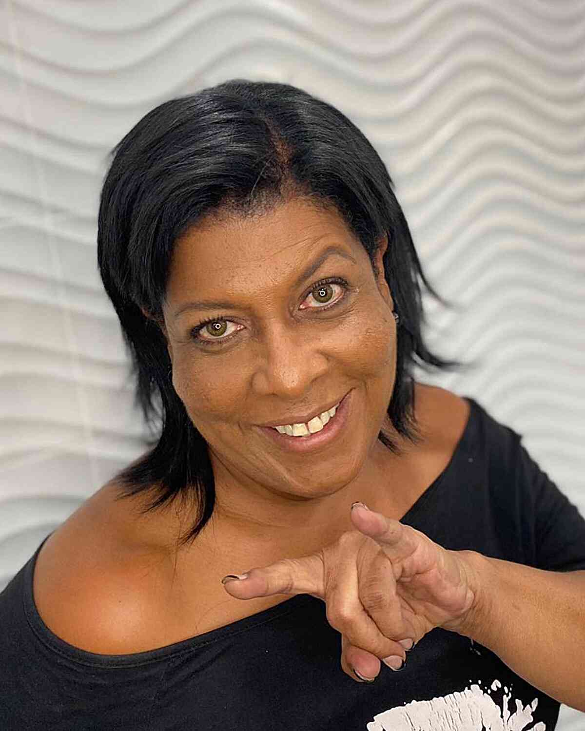 Straightened and Natural Short Hairstyle for Black Women Aged 50