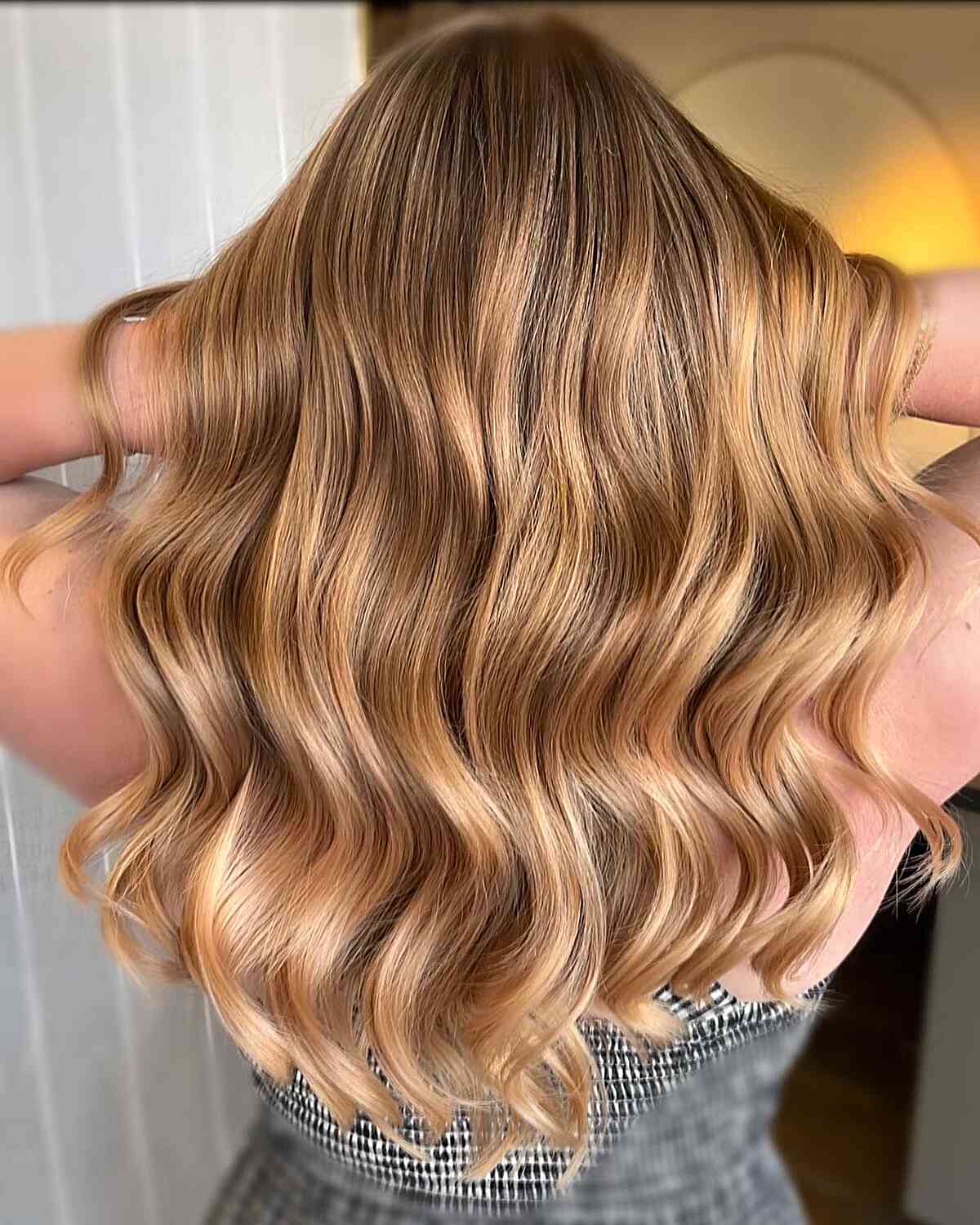 Strawberry Blonde Balayage on Long Soft Wavy Hair