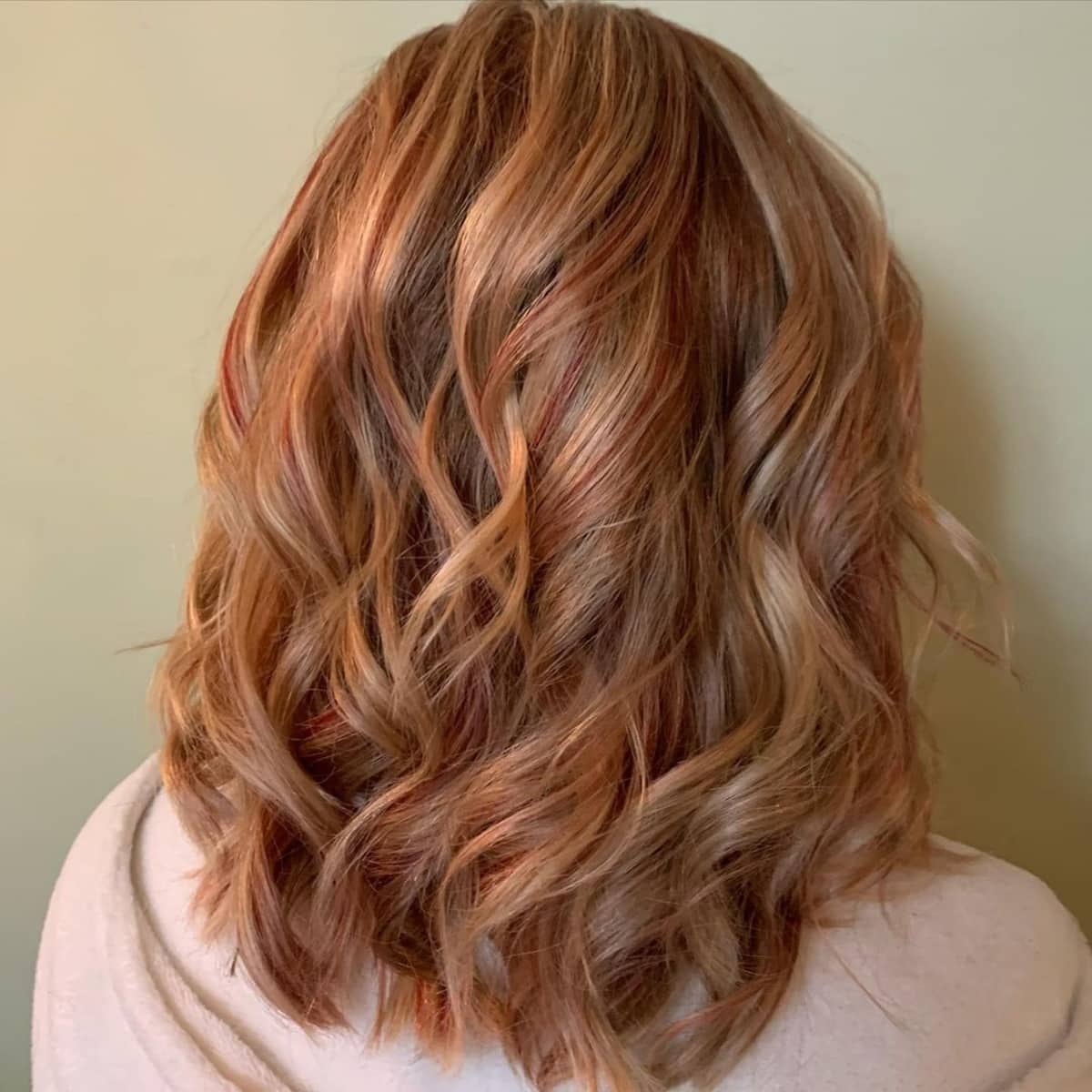 Strawberry blonde curly hair