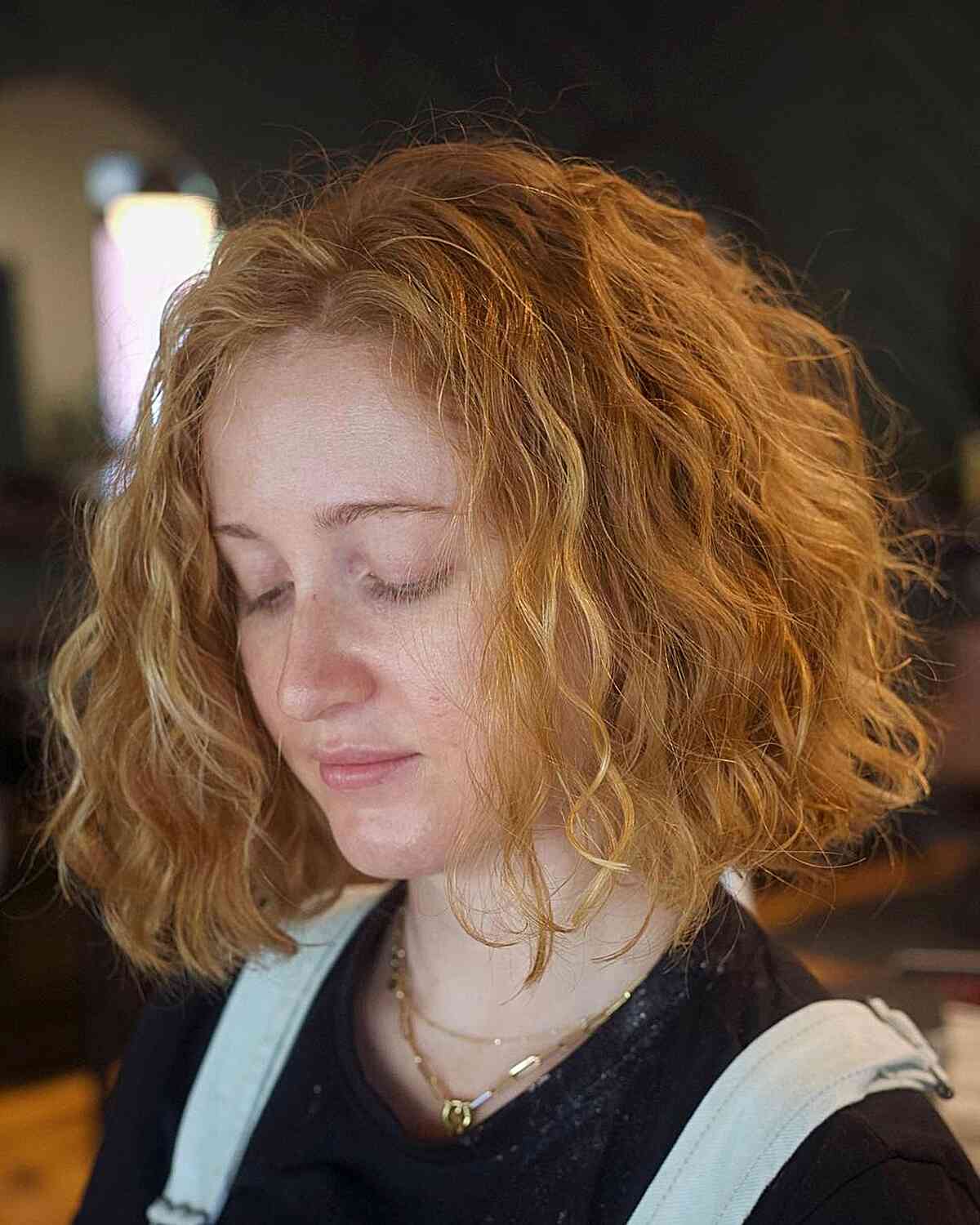 Strawberry Blonde Short Thick Hair with Loose Curls and Waves
