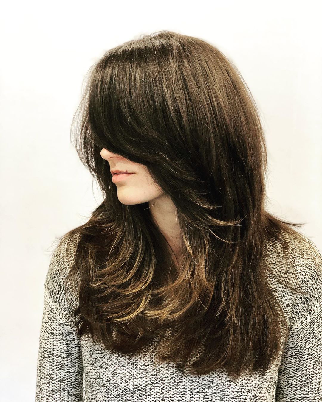 Stunning Long Shaggy Hair with Side-Swept Bangs