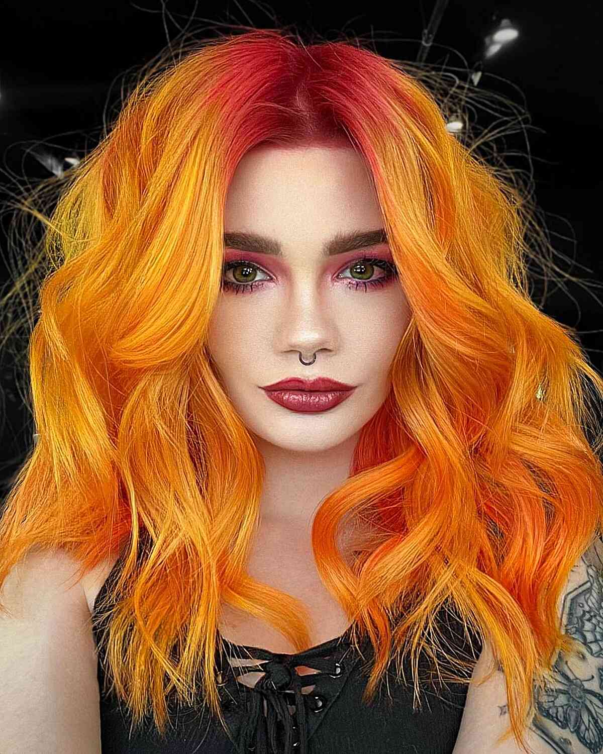 Stunning Shade of Orange Hair with Red roots and layered waves