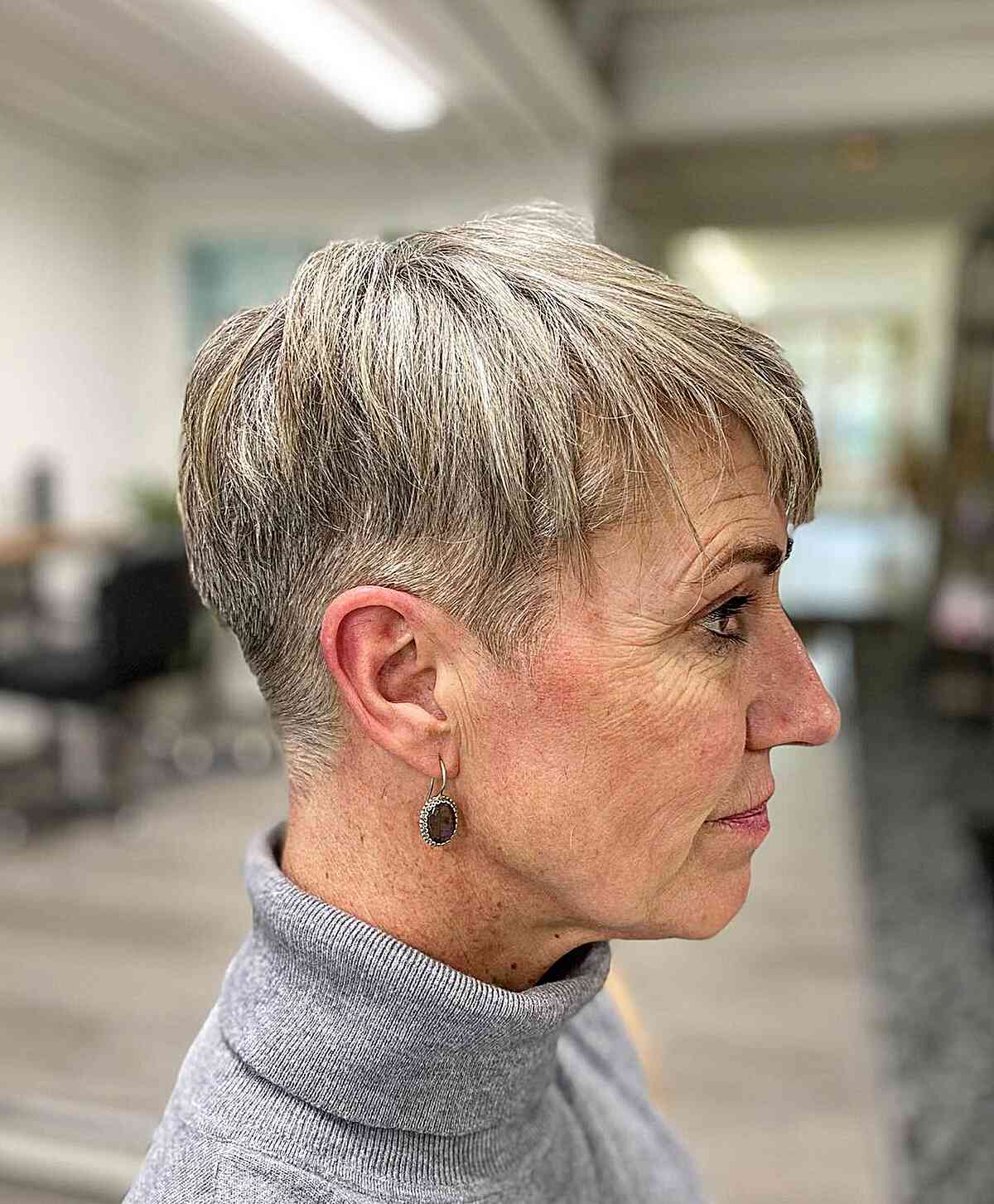 Stylish Brushed-Forward Fringe on a Pixie Cut for 60-Year-Old Ladies
