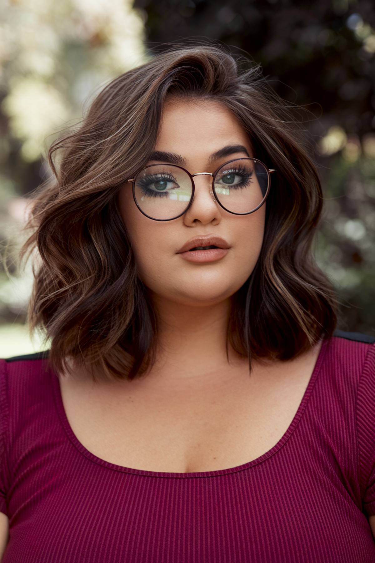 Medium bob haircut with loose waves for plus size women