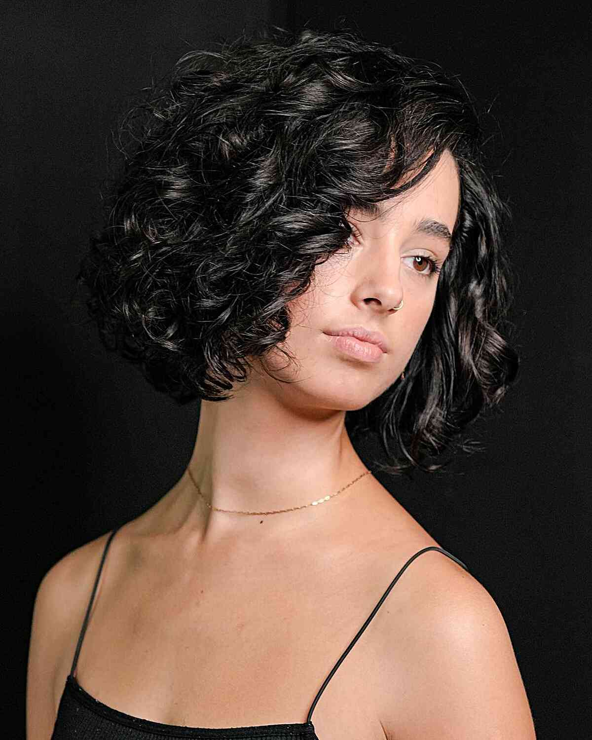 Stylish Medium-Short Haircut for Curly Hair