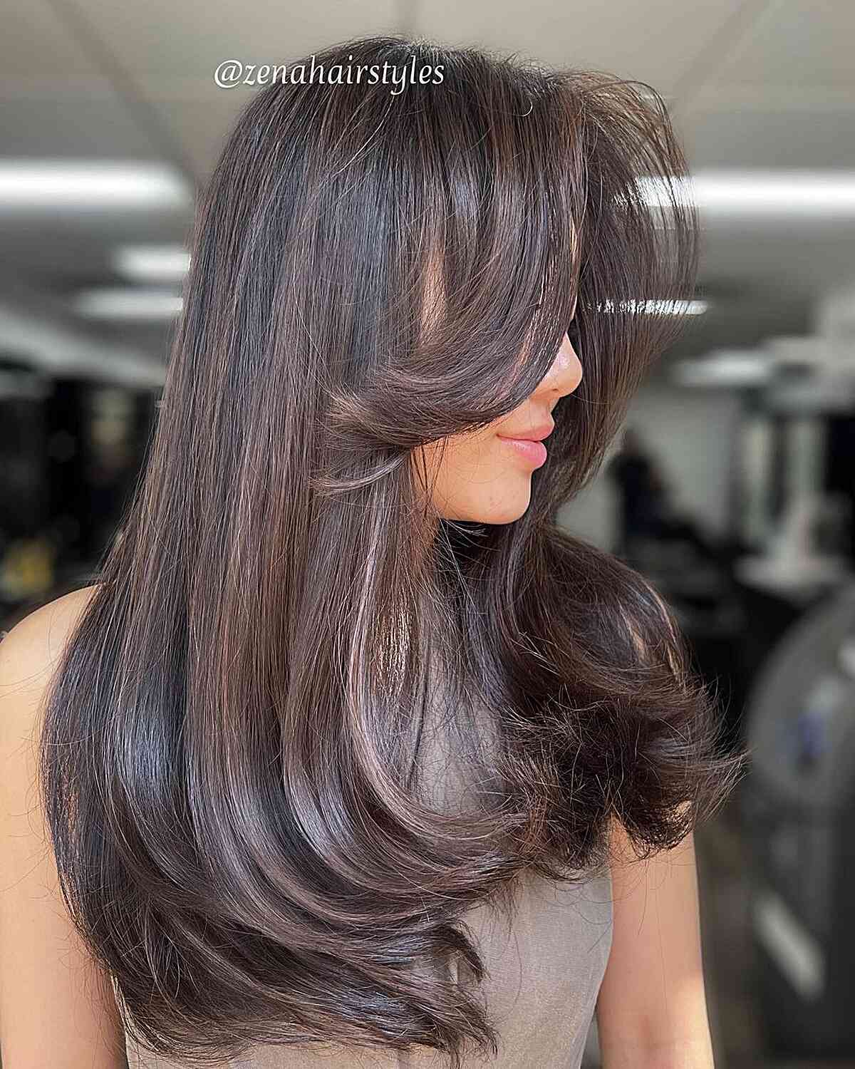 Subtle Brown Balayage on Black Hair with Mid-Long Voluminous Layers