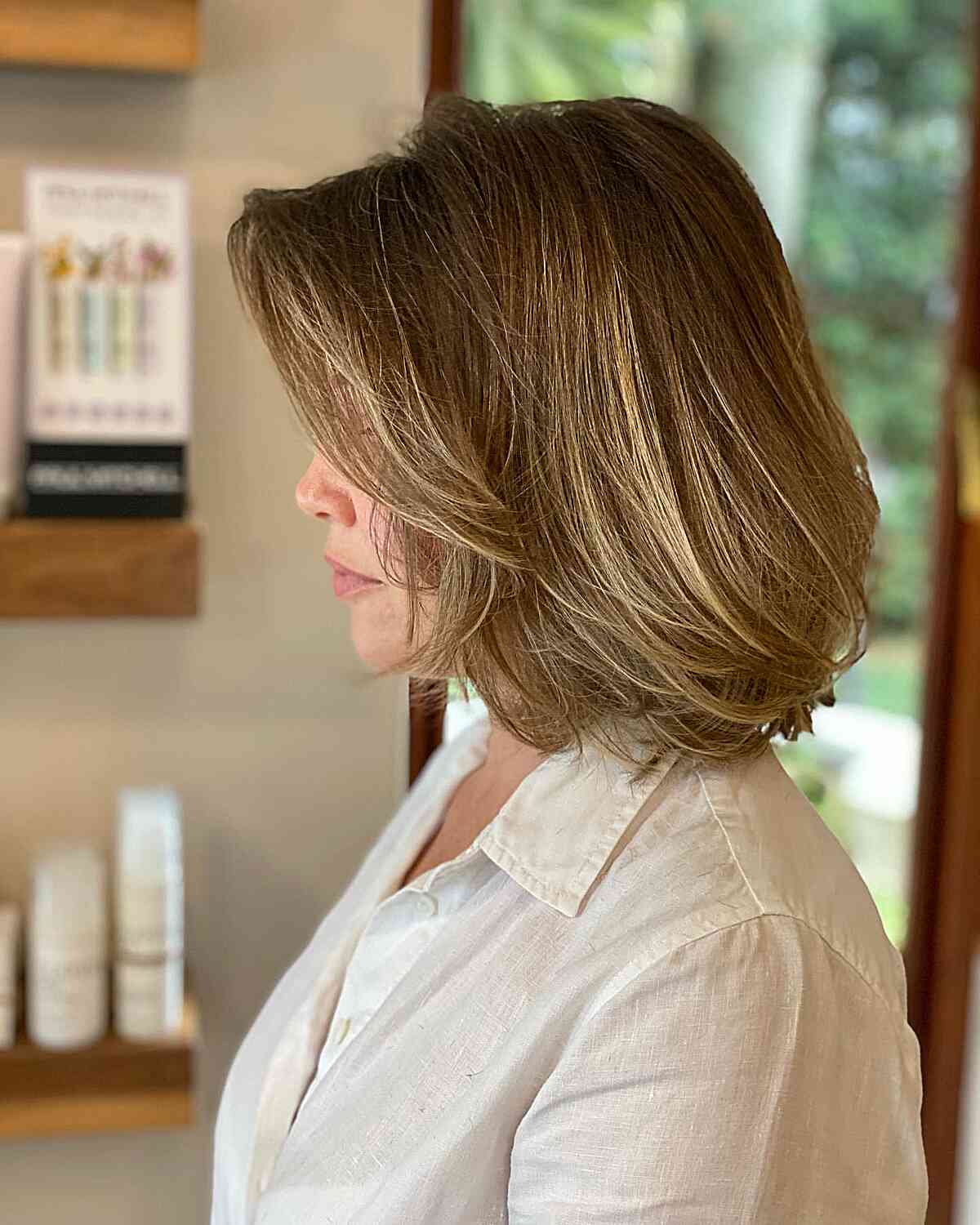 Shoulder-grazing bob with subtle Choppy Layers for Women Over 40