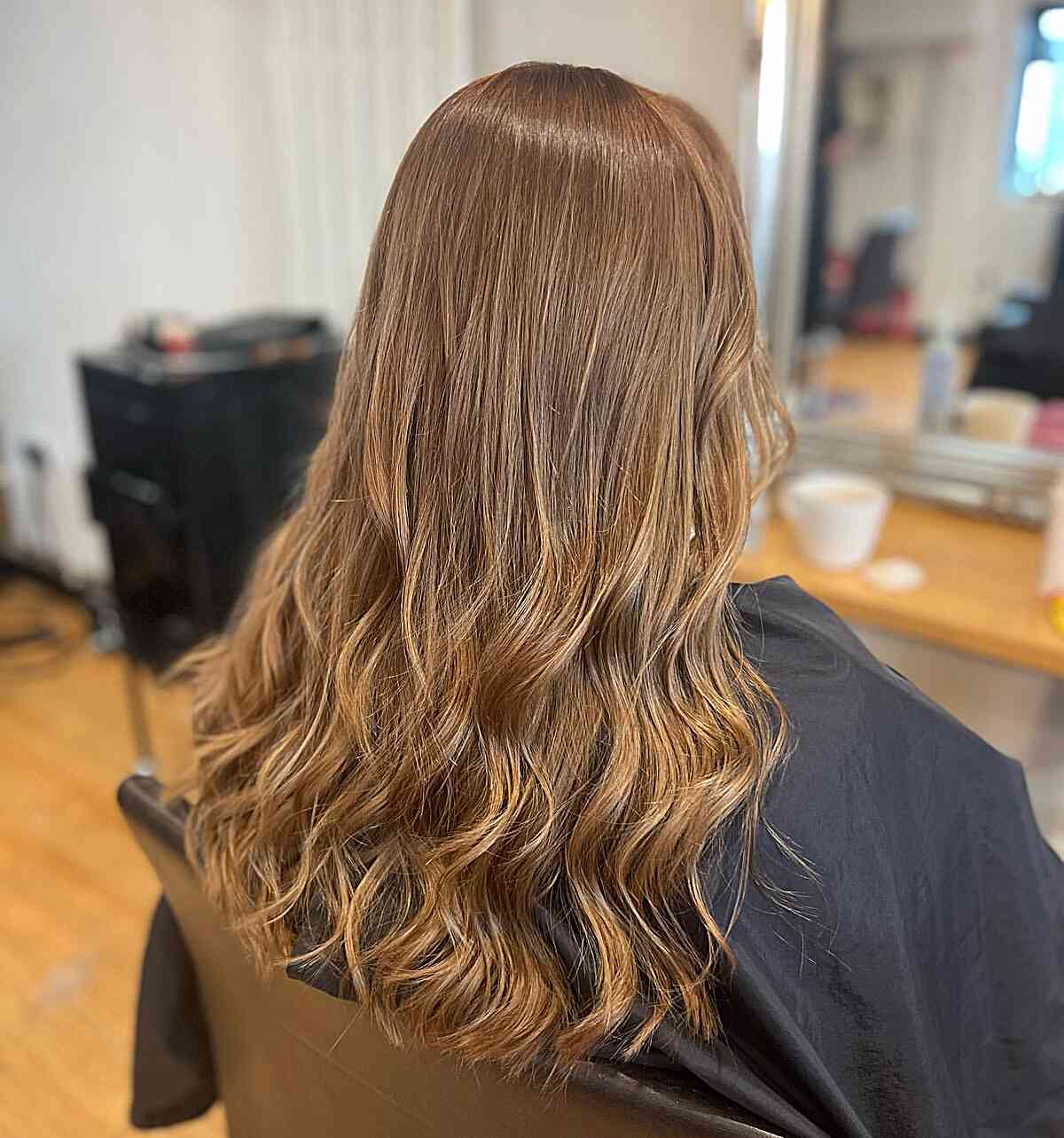 Subtle Gold Highlights on Longer Light Brown Hair
