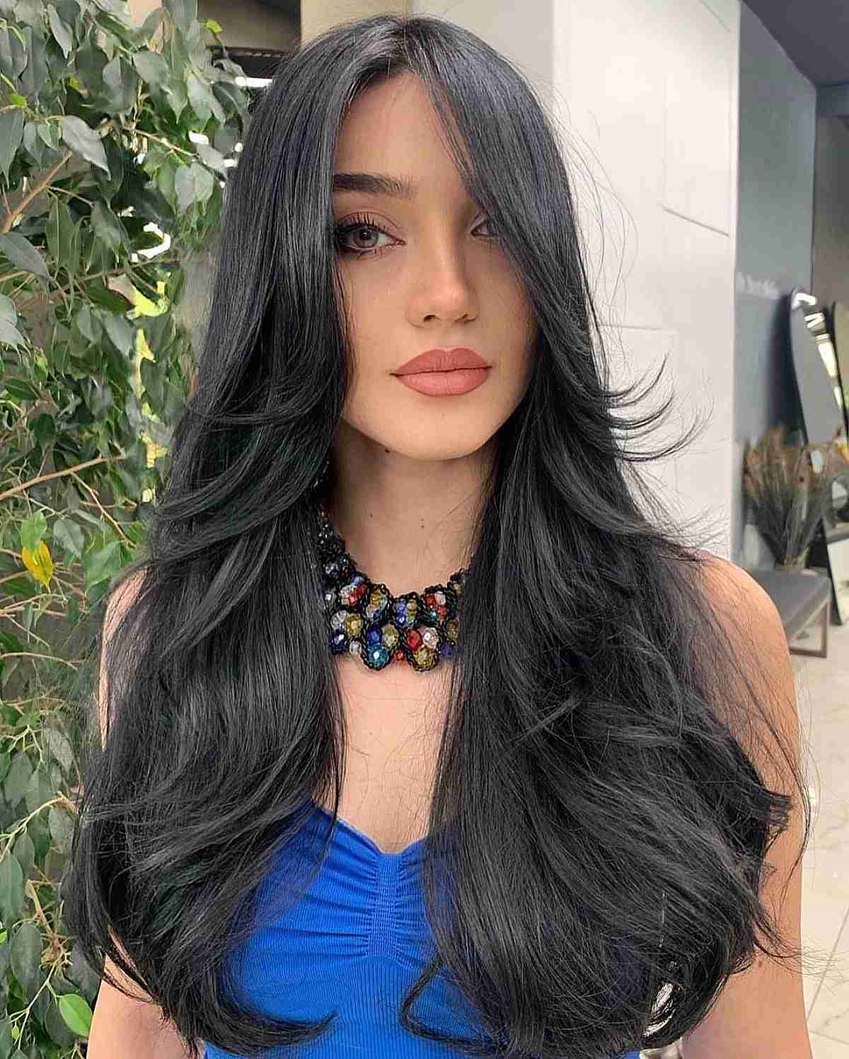 Sultry Long Layered Hair with Long Bangs