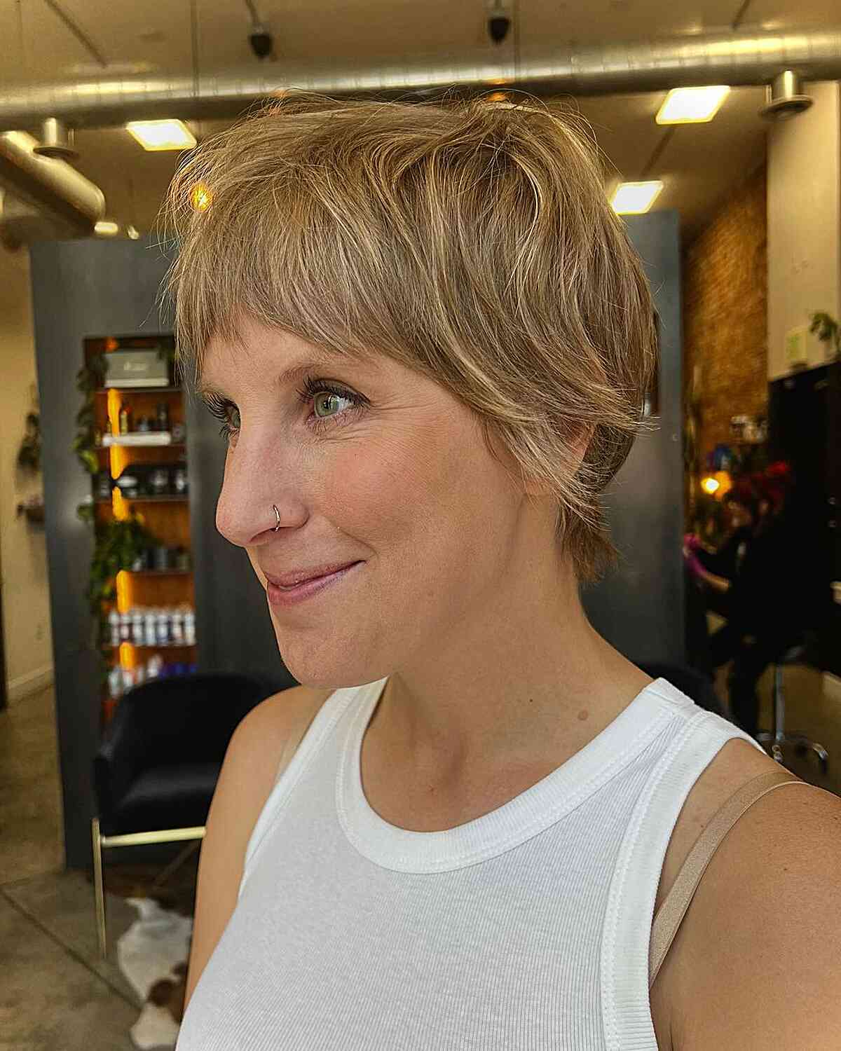 Short Sun-Kissed Blonde Wixie Hair with Bangs for Oval Faces