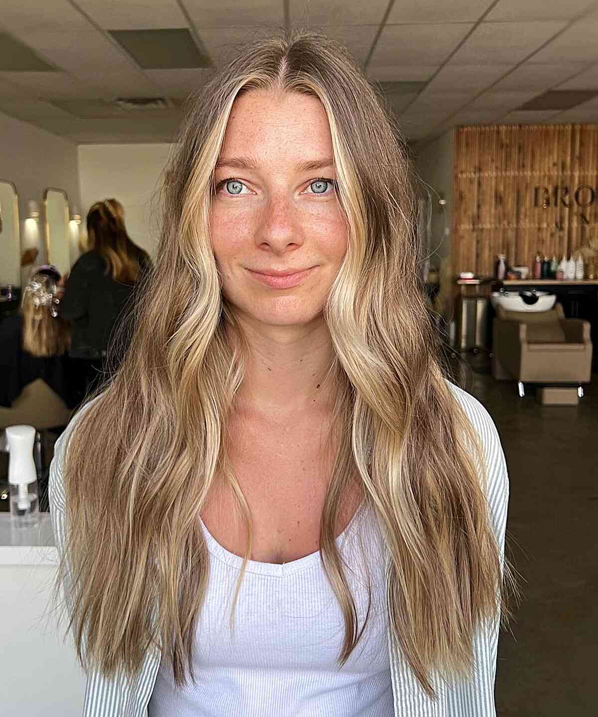 Long Hair with Dirty Sun-Kissed Blonde Balayage and Money Pieces