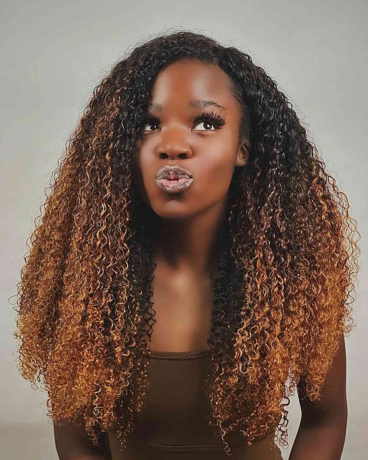 Sun-Kissed Honey Ombre on Long-Length Curly Weave