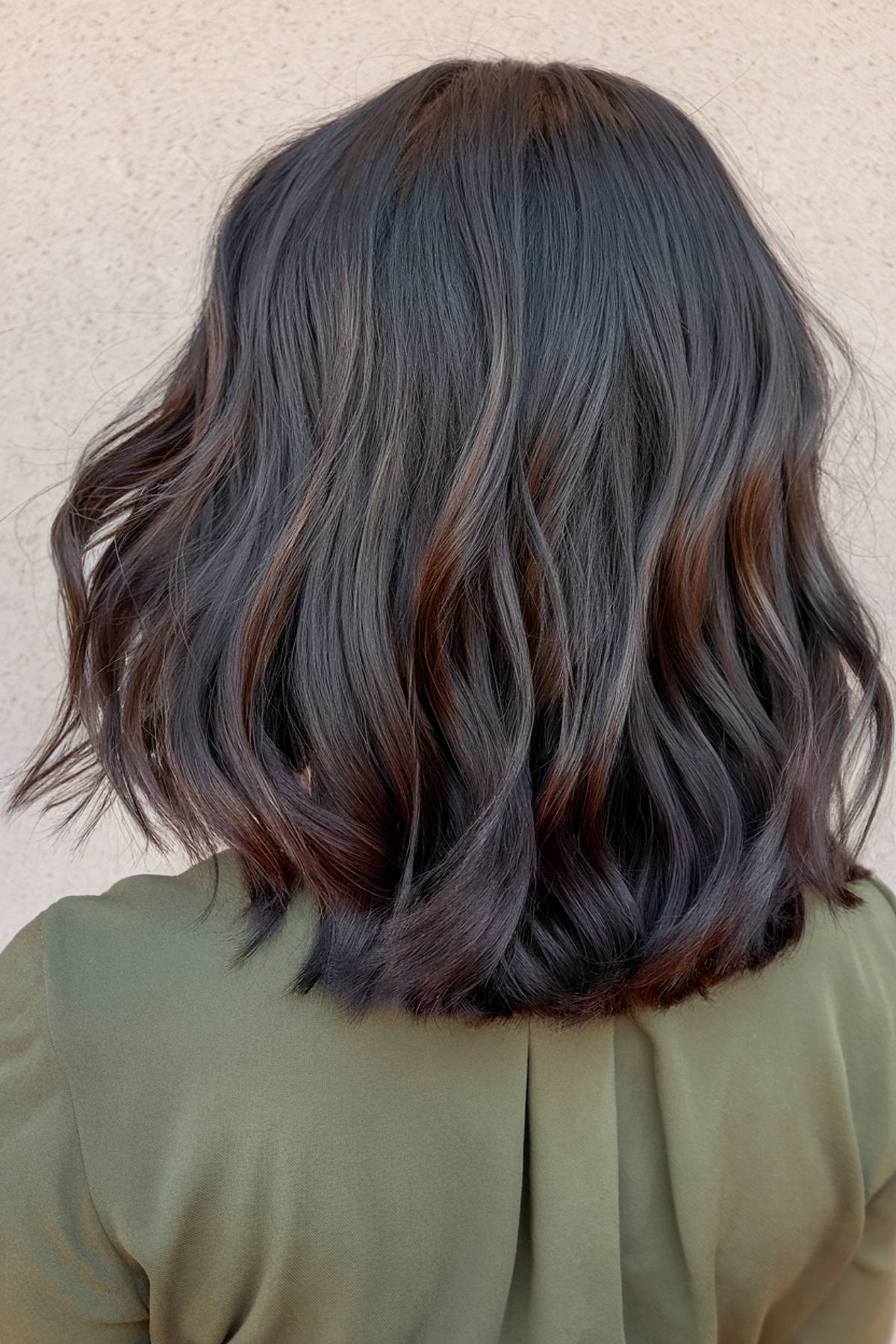 Sunkissed brunette balayage on black hair