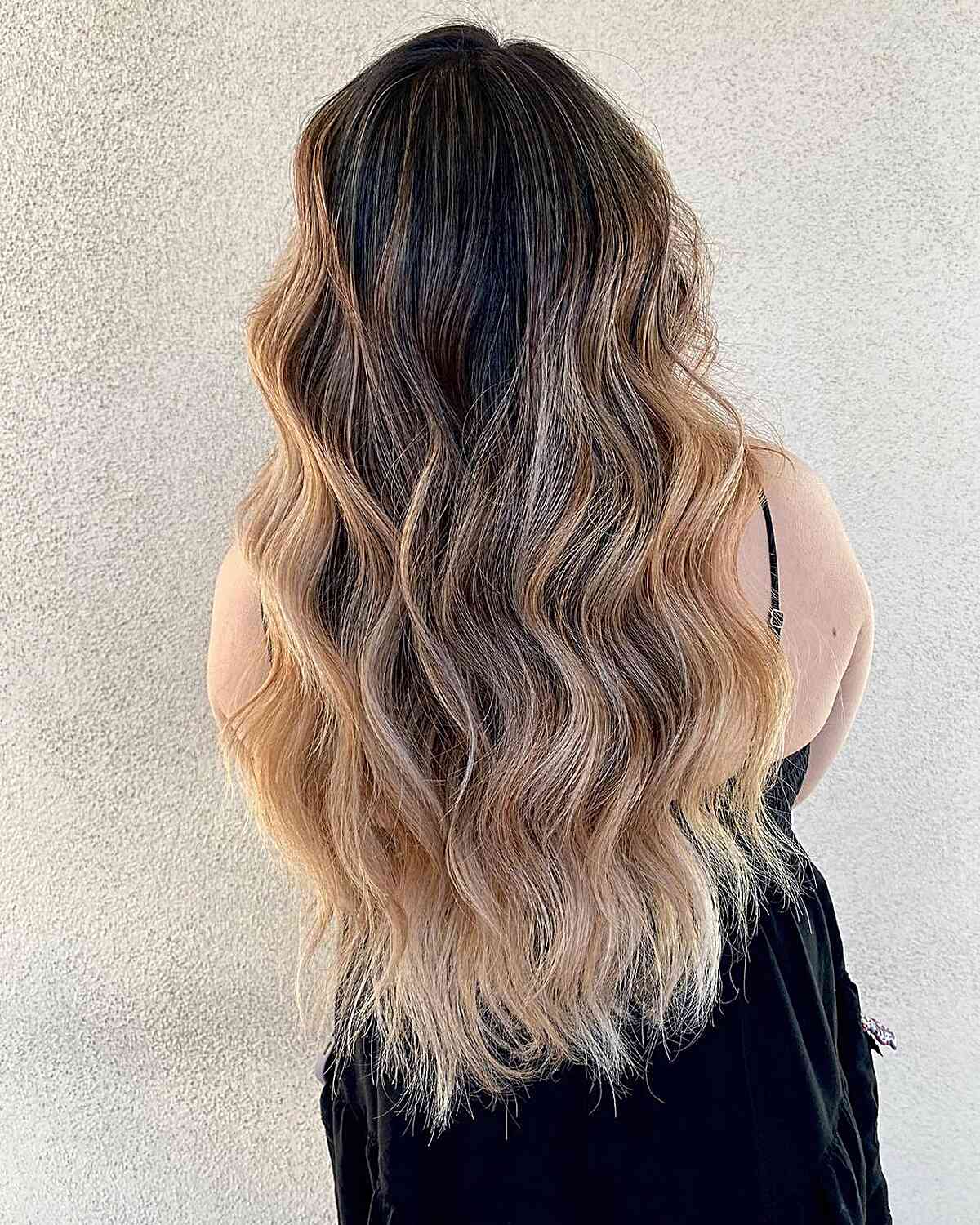 Super Long Haircut with Golden Balayage and Beach Waves