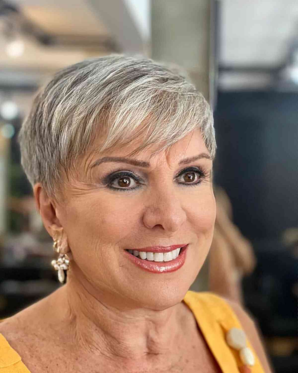 Sweeping Fringe on a Short Grey Pixie for Ladies Aged 60