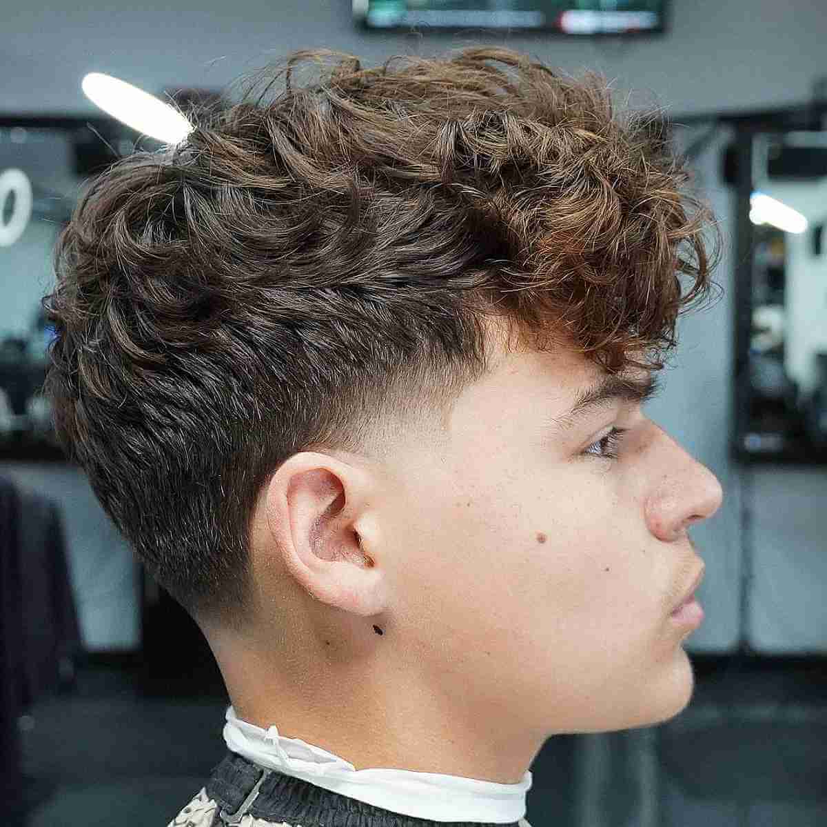 Taper Fade Haircut with Tousled Curls