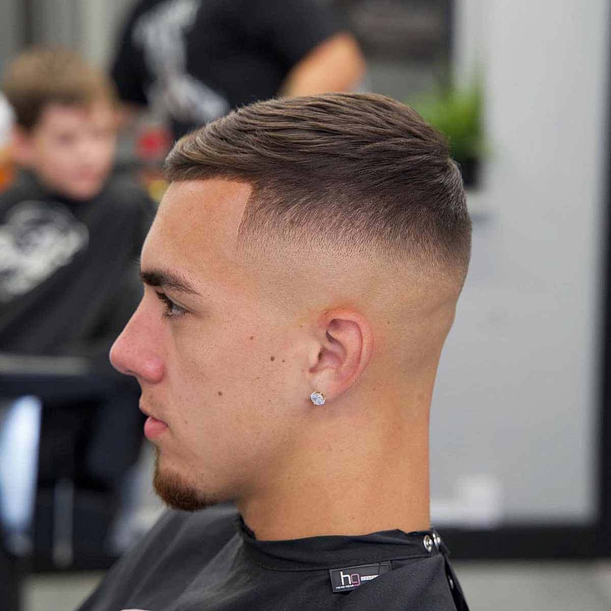 Tapered Caesar Cut with Mid Bald Fade