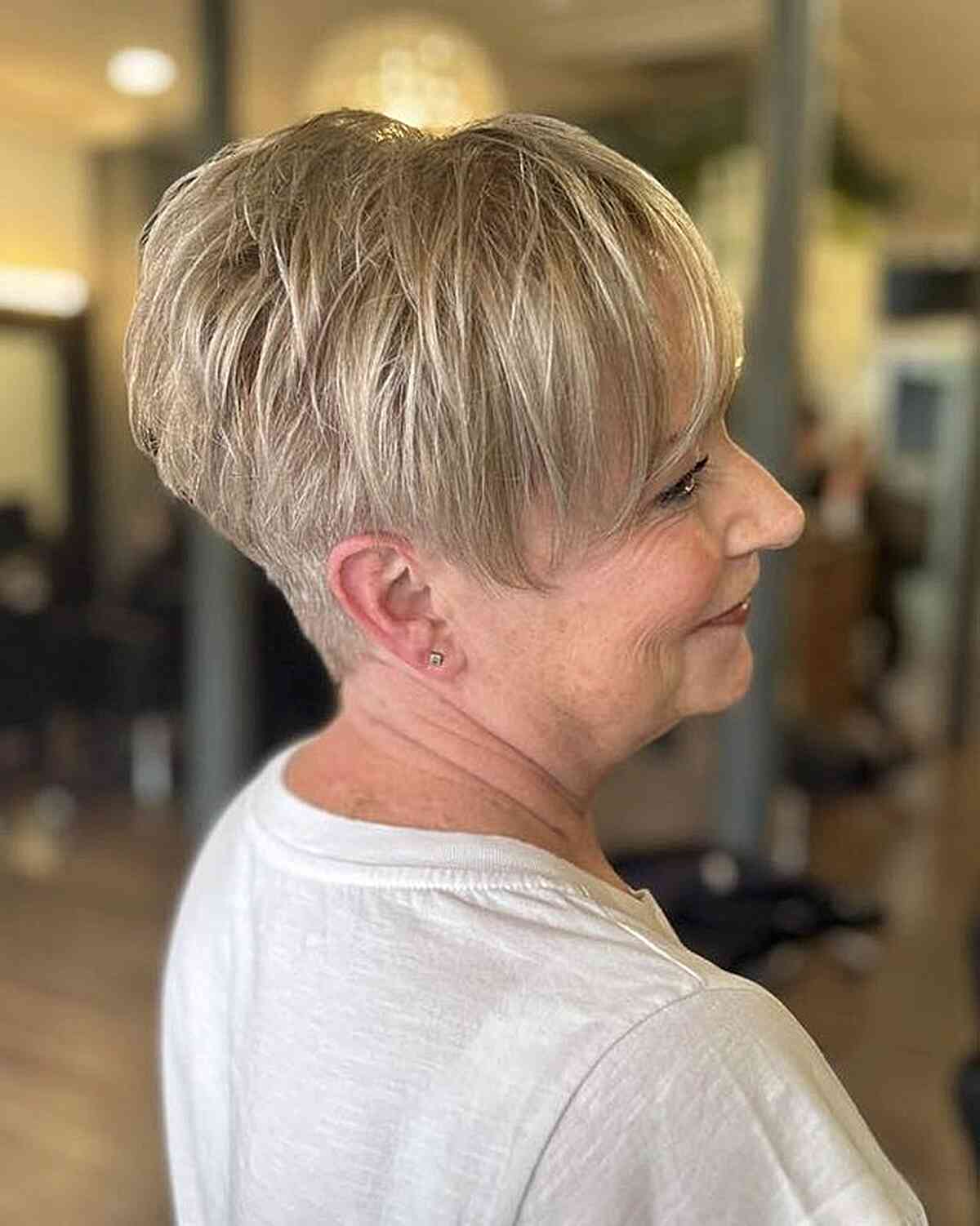 Tapered Choppy Pixie Cut with Long Fringe on Mature Women Aged Sixty
