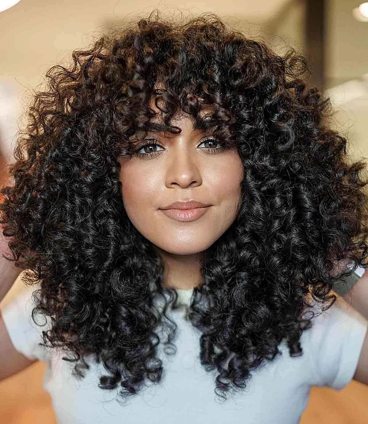 Tapered Curls and Layers for women with thick hair and a heart face