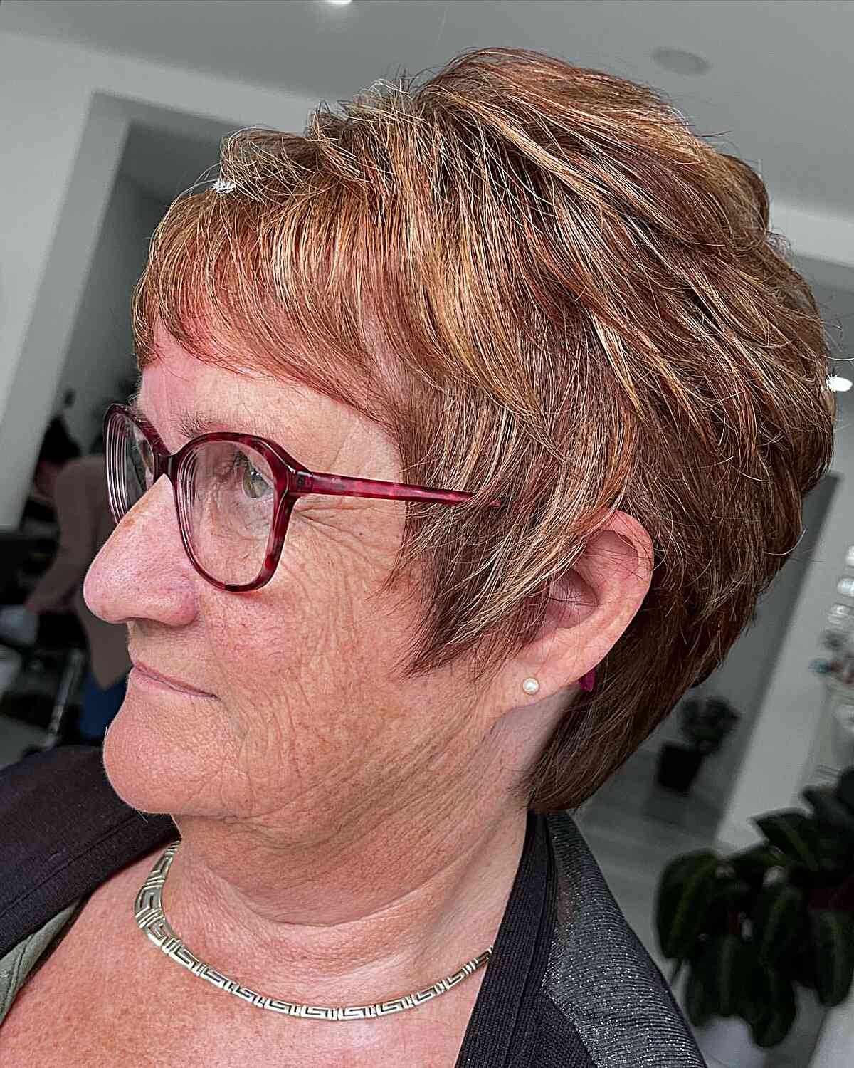 Tapered Layers and Mini Bangs on Short Choppy Pixie for Older Ladies Aged 70 with Glasses