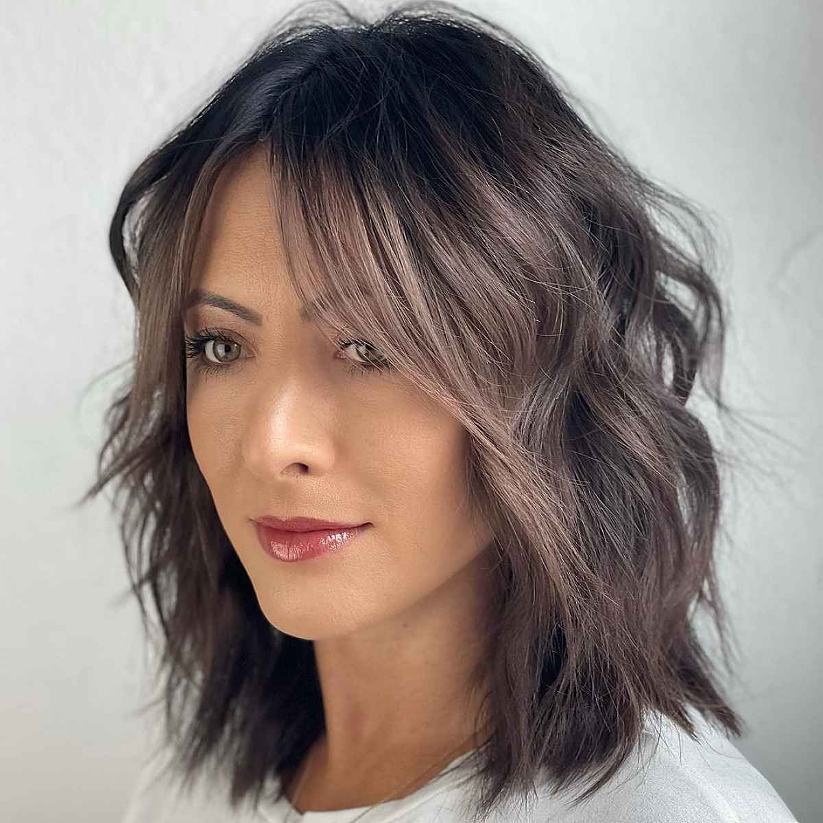 teased bob hairstyle for women in their 40s