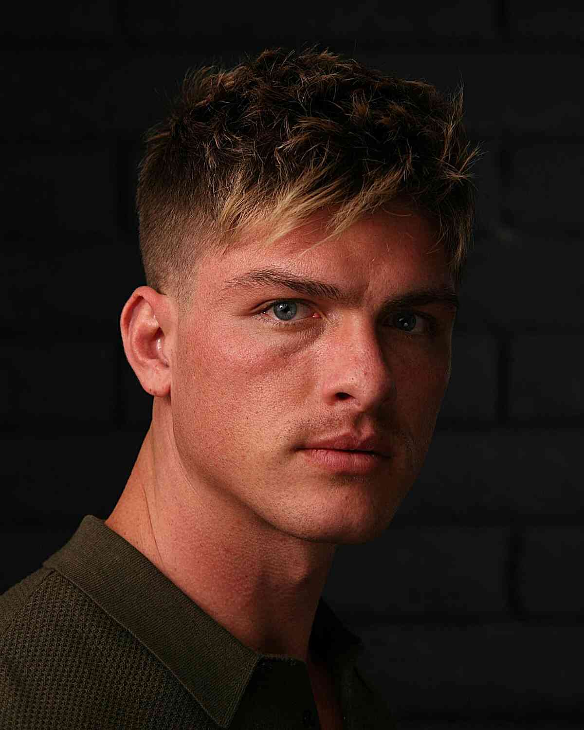 Textured Bangs Side-Swept Hairstyle with Faded Sides for Men