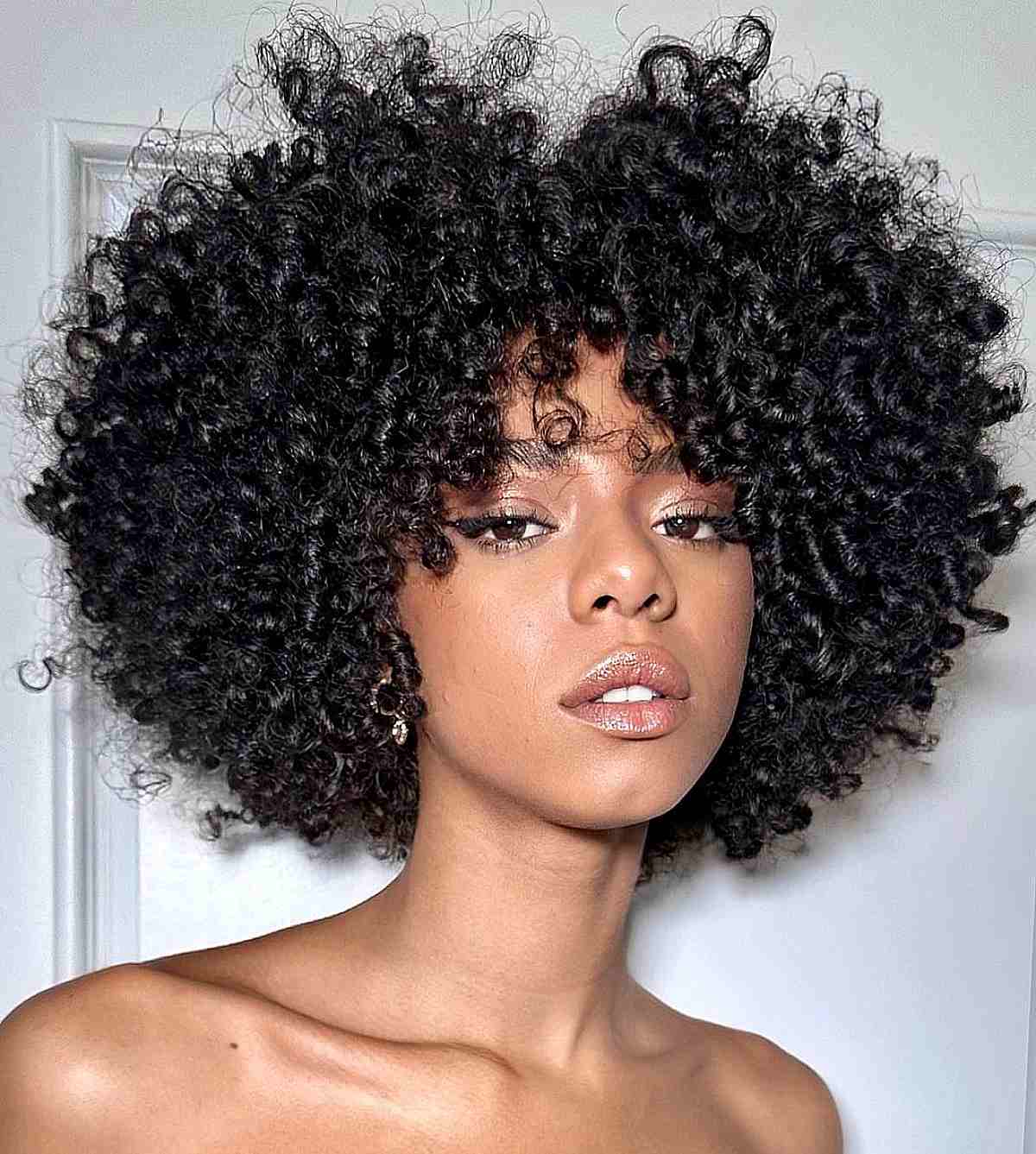 Textured Bouncy Curls with Short Face-Framing Layers for Girls