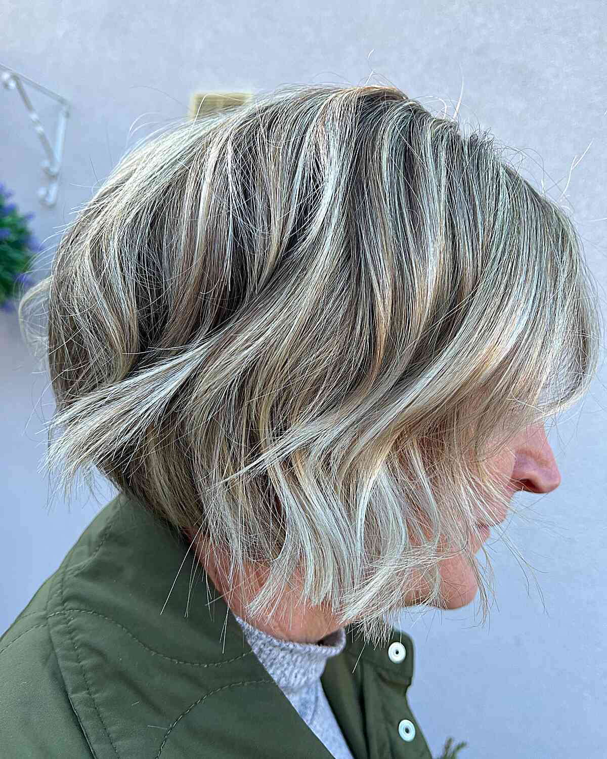 Textured Chin Bob with Razored Layers and Dimensional Cool Bronde Color