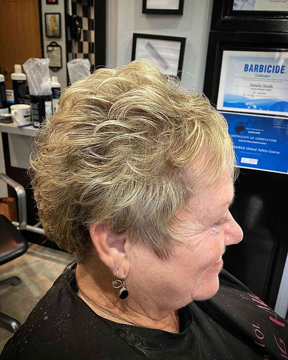 Textured Choppy Short Hair with Blonde Highlights for 60-year-olds