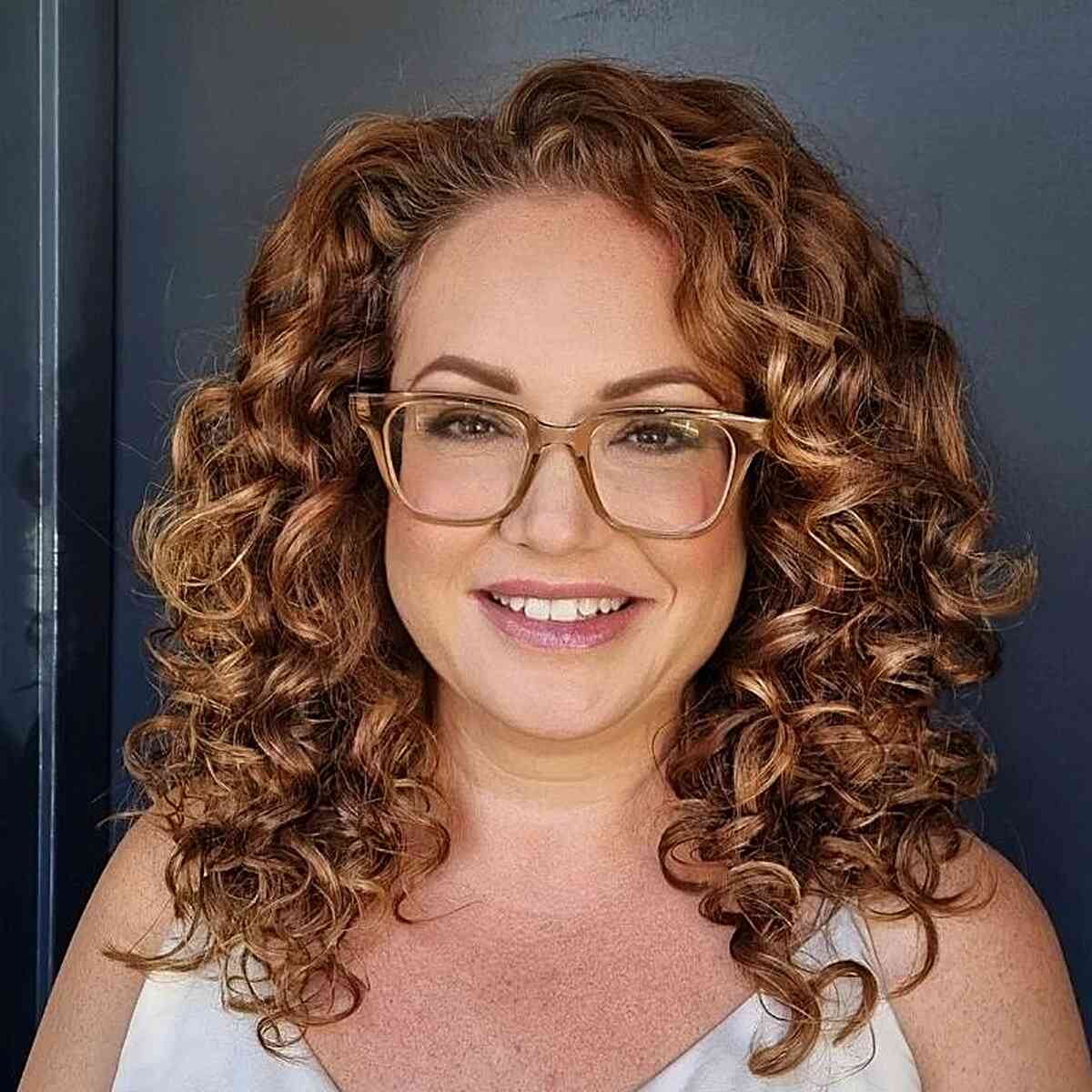 Textured Curls with Layers for women with thick curly hair and eyeglasses