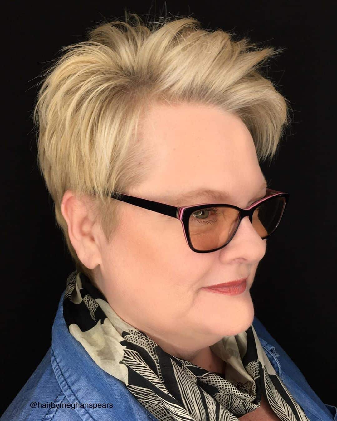 textured pixie haircut for woman over 50 with glasses