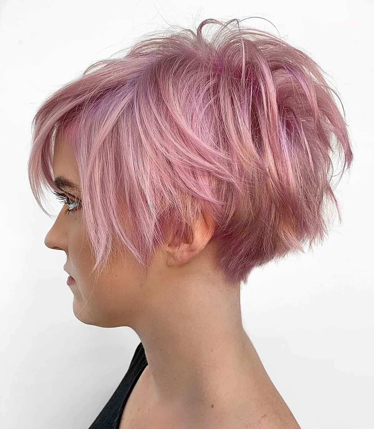 Textured Pixie Shag Cut with a Pastel Pink Color