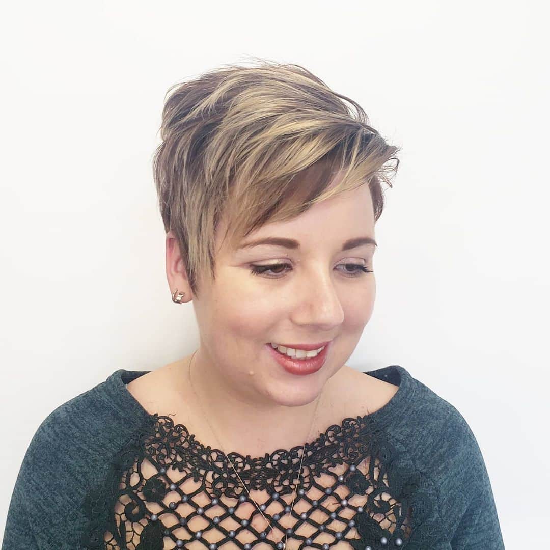 Modern textured pixie with side-swept bangs for round face