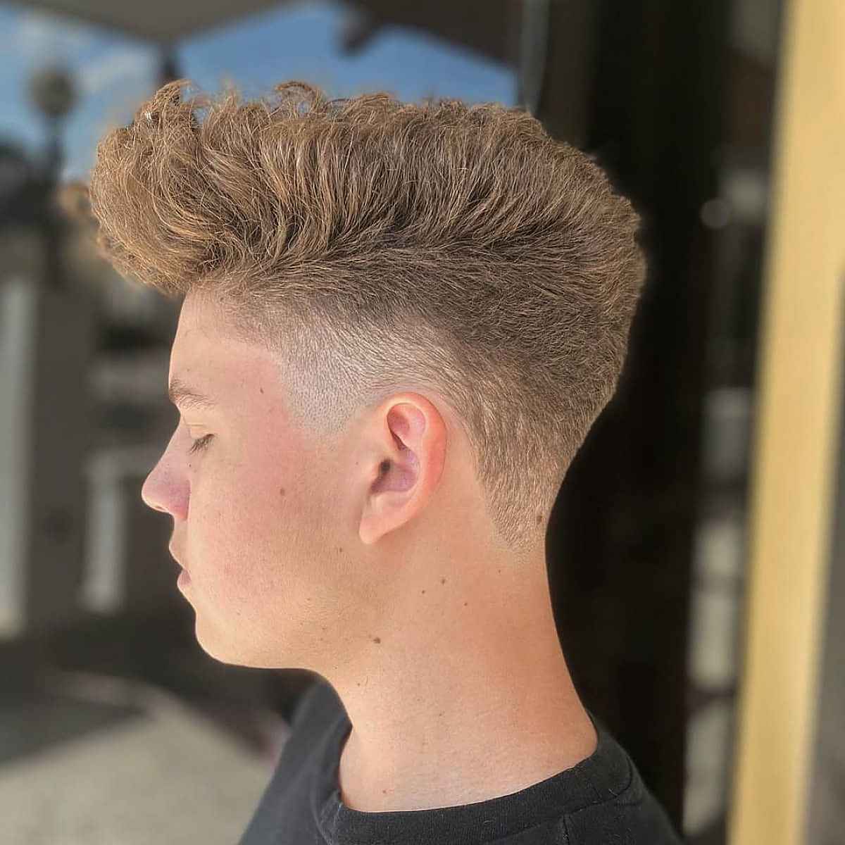 Textured Pompadour with Razor Fade for Curly Hair
