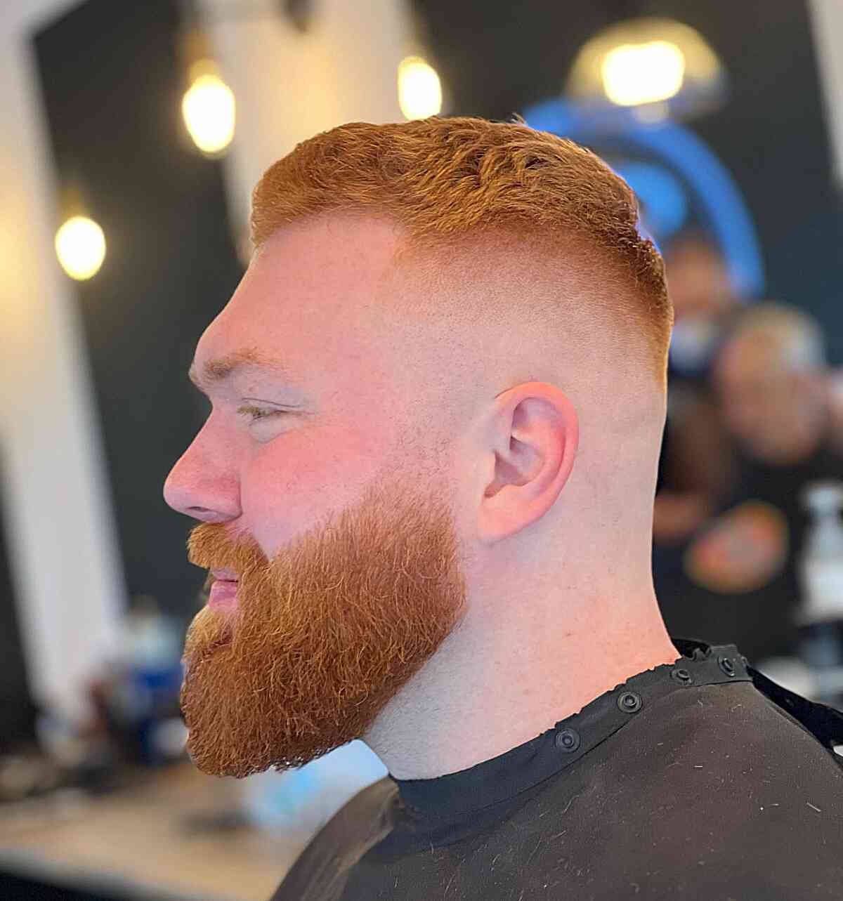 Textured Red Hair with Skin Faded Undercut on Men with Thick Hair and Beard