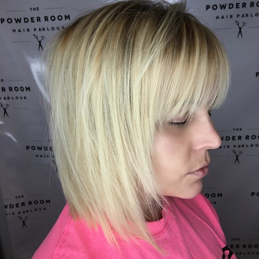 bob haircut with bangs for round faces