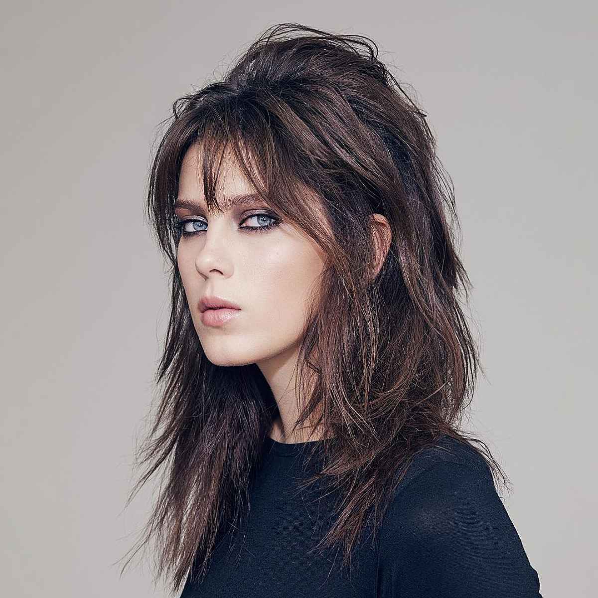 Textured Wolf Style with Bangs for Medium-Length Hair