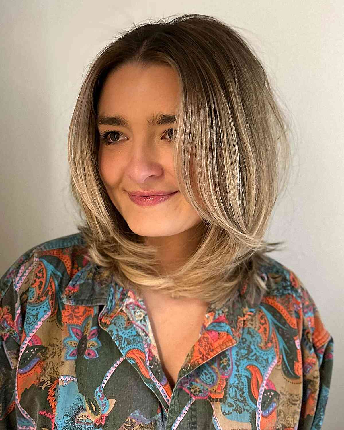 The 90s Rachel Hairstyle with Middle Part for Medium Cut