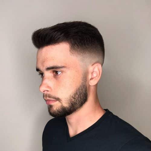 short fade hairstyle with a bald fade