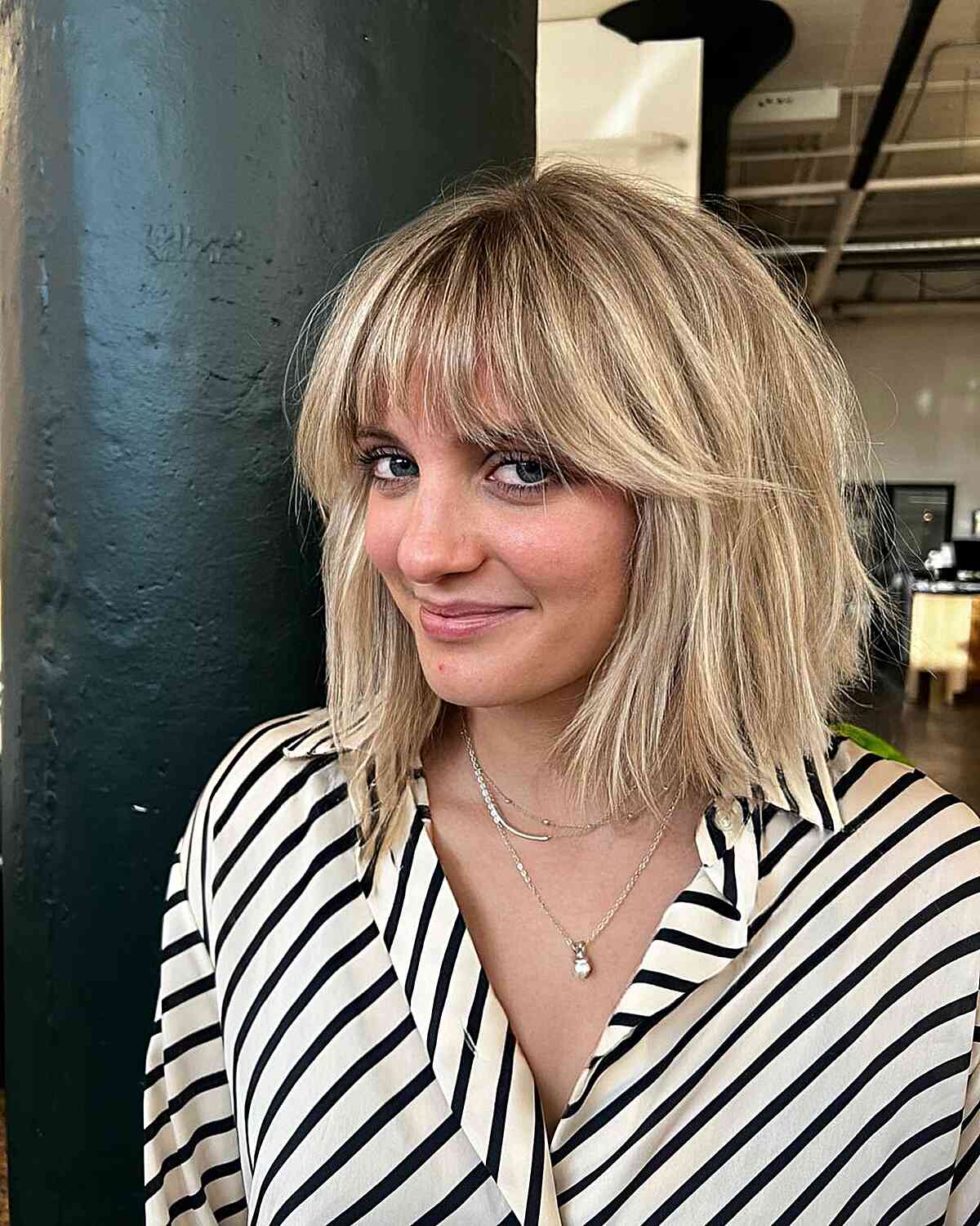 The Choppiest Bangs on a Bob for women with thick short hair
