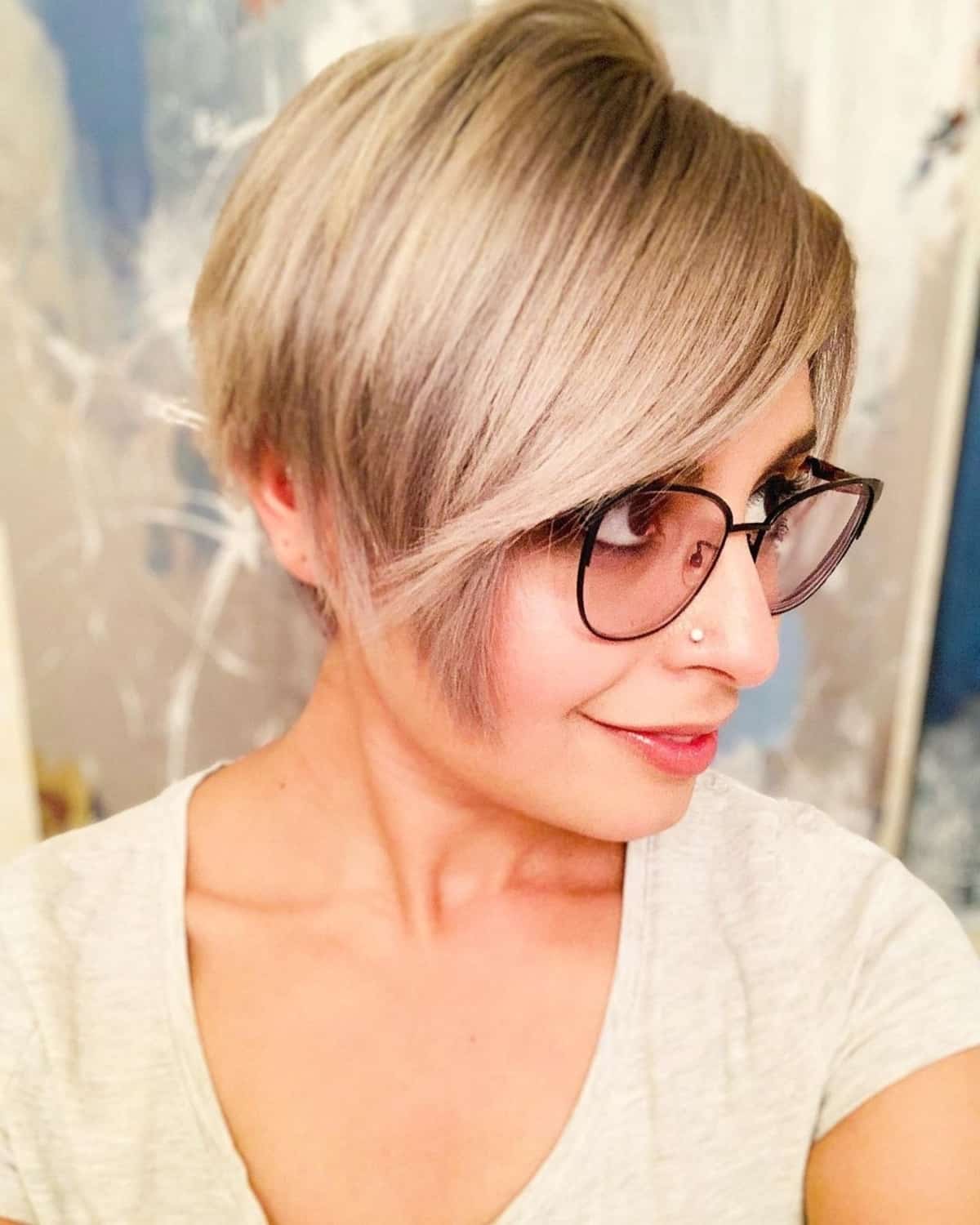 The classic pixie cut for women with glasses and thin hair