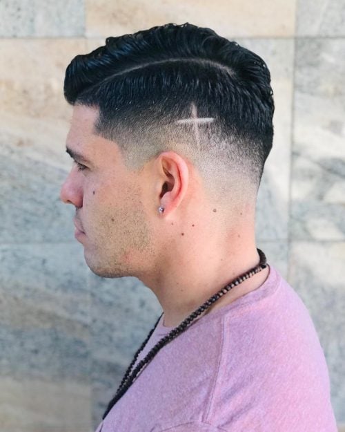The Cross Hair Design on a Medium Fade Cut