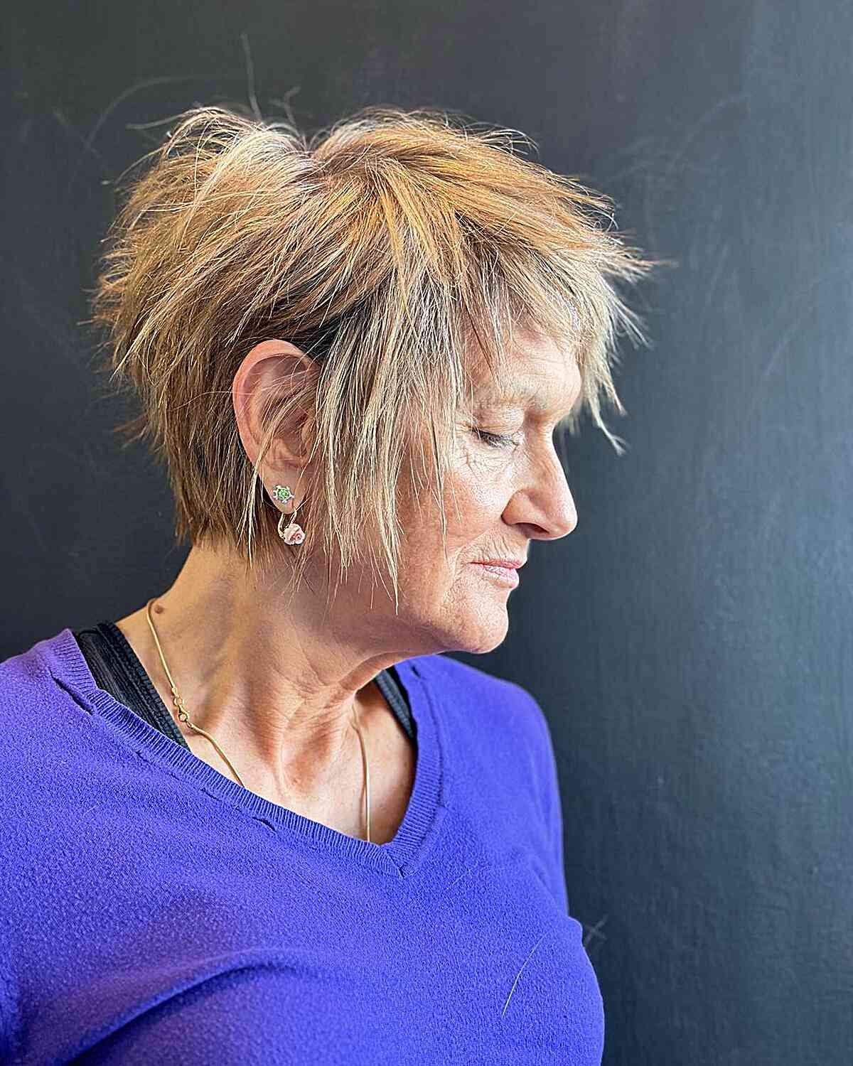 The Messy Long Pixie with Choppy Face-Framing Layers for women in their 60s with thin hair