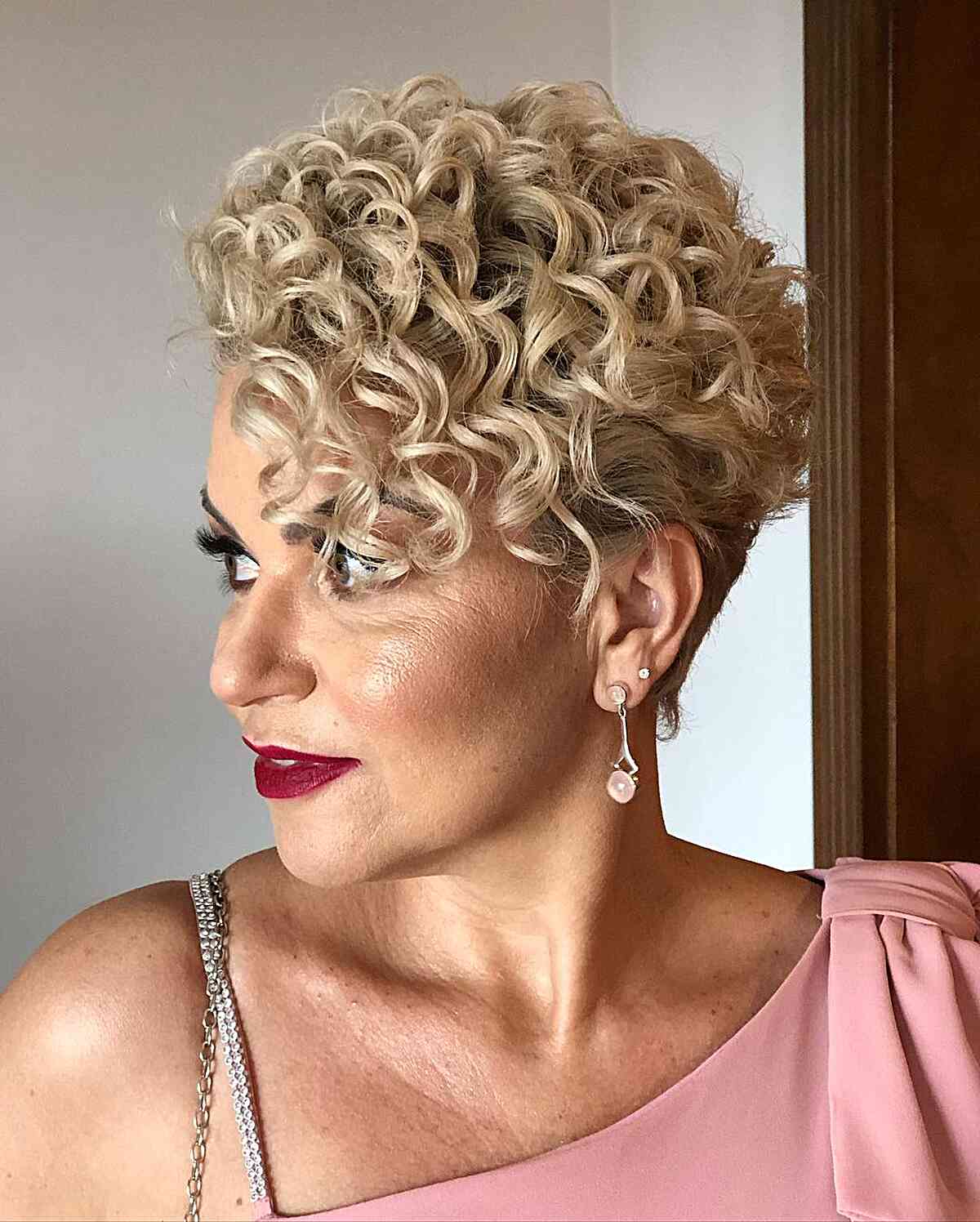 The Perfect Curly Pixie for women with an edgy style and shaved nape