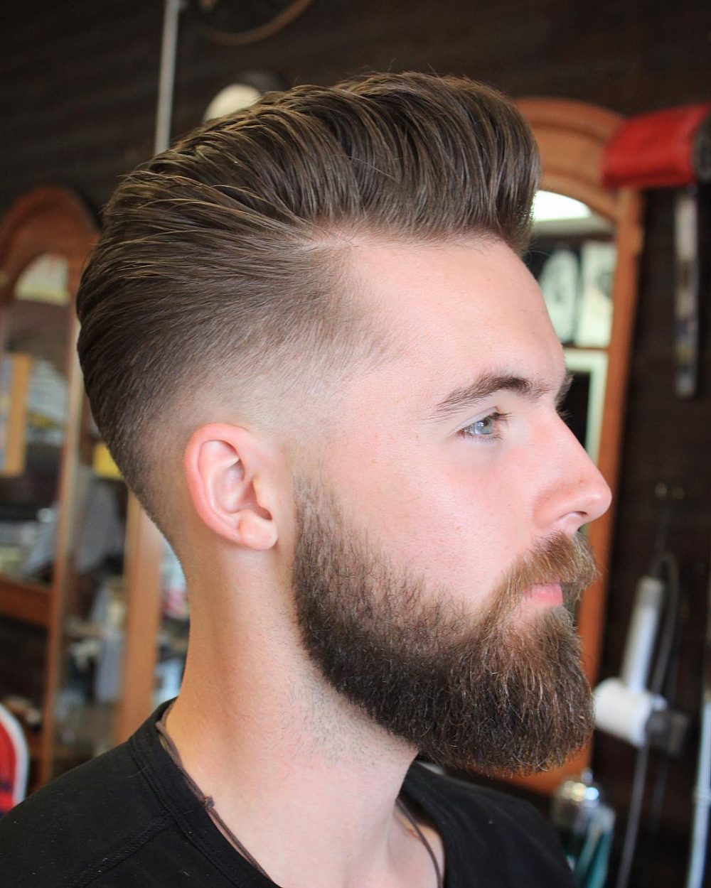 The Low Fade Pompadour with a Maintained Beard